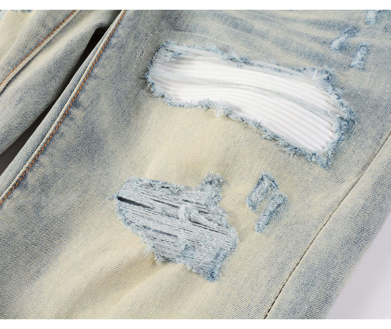 Men's light blue ripped patches jeans with distressed slim fit design
