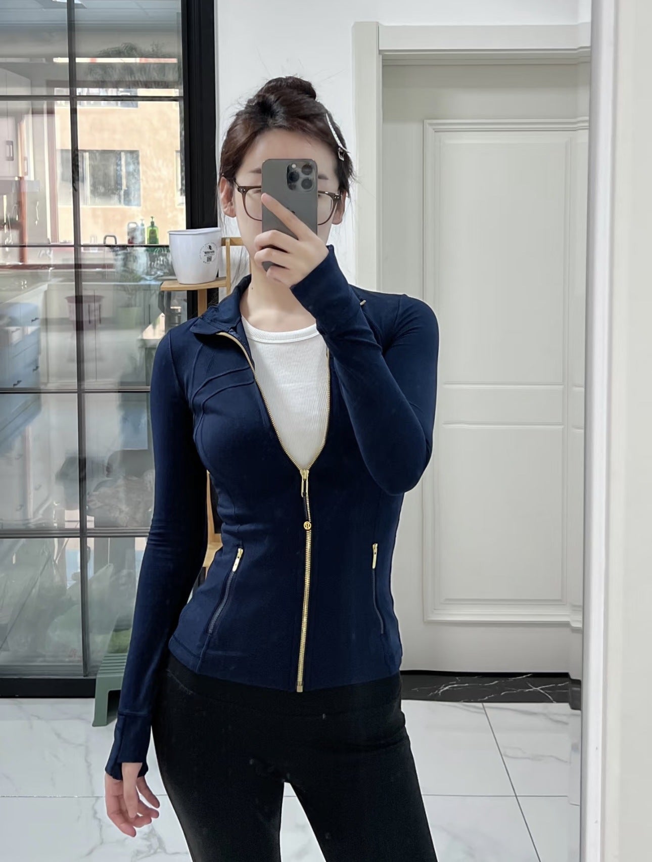 Woman wearing Golden Edge Define Slim Sports Jacket in Twilight Rose color during yoga session