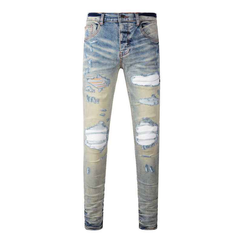 Men's light blue ripped patches jeans with slim fit and distressed details